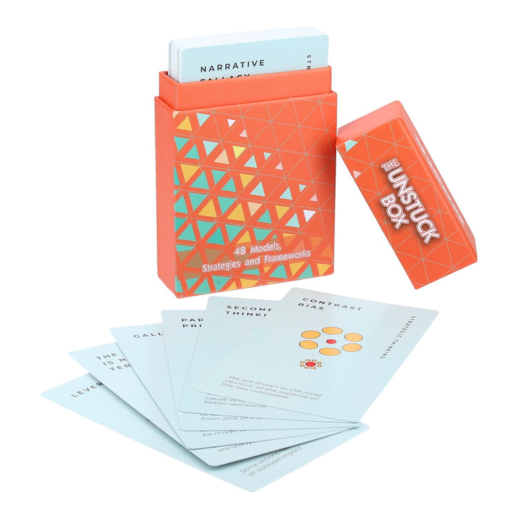The Unstuck Box - Upsized Edition, a career coaching deck with 48 cards, displayed next to its durable box.