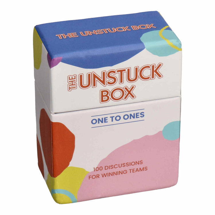 The Unstuck Box: One to Ones, a deck of 100 prompts designed to enhance team communication, packaged in a colorful, text-labeled box.