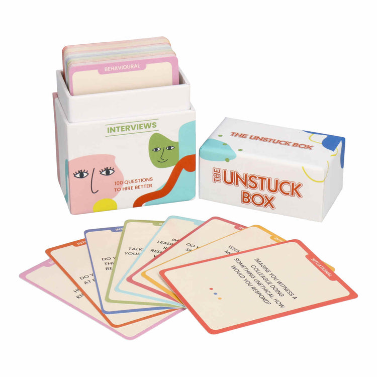 The Unstuck Box: Interviews, featuring a white box with 100 interview cards, designed to assess candidate abilities, motivation, and leadership skills.