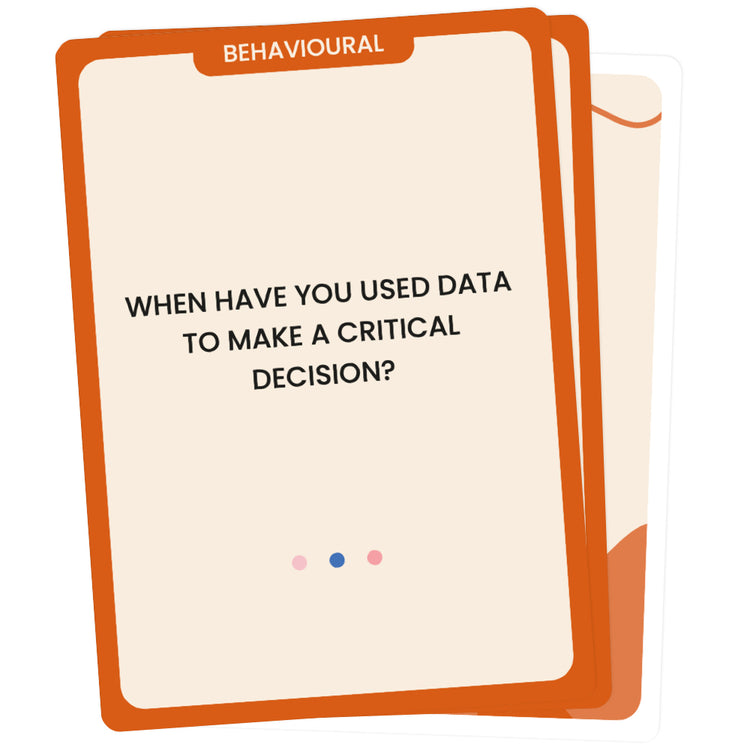 The Unstuck Box: Interviews - A deck of 100 interview cards displayed on a clipboard, designed to help you build the best team with structured interview questions.