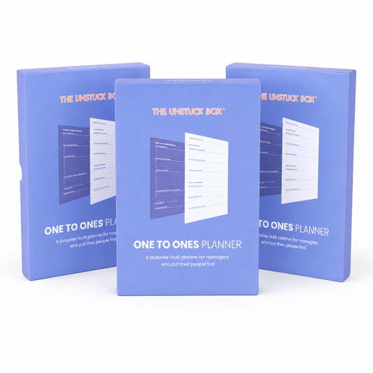 Three One to Ones Planners arranged as a small team pack