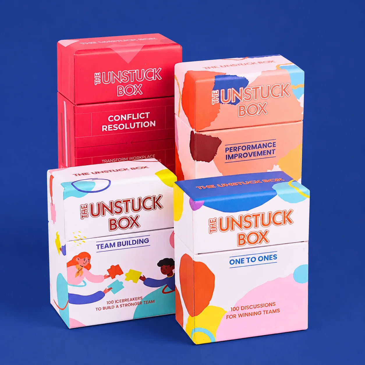 The Unstuck Box card decks for One to Ones, Team Building, Conflict Resolution, and Performance Improvement.